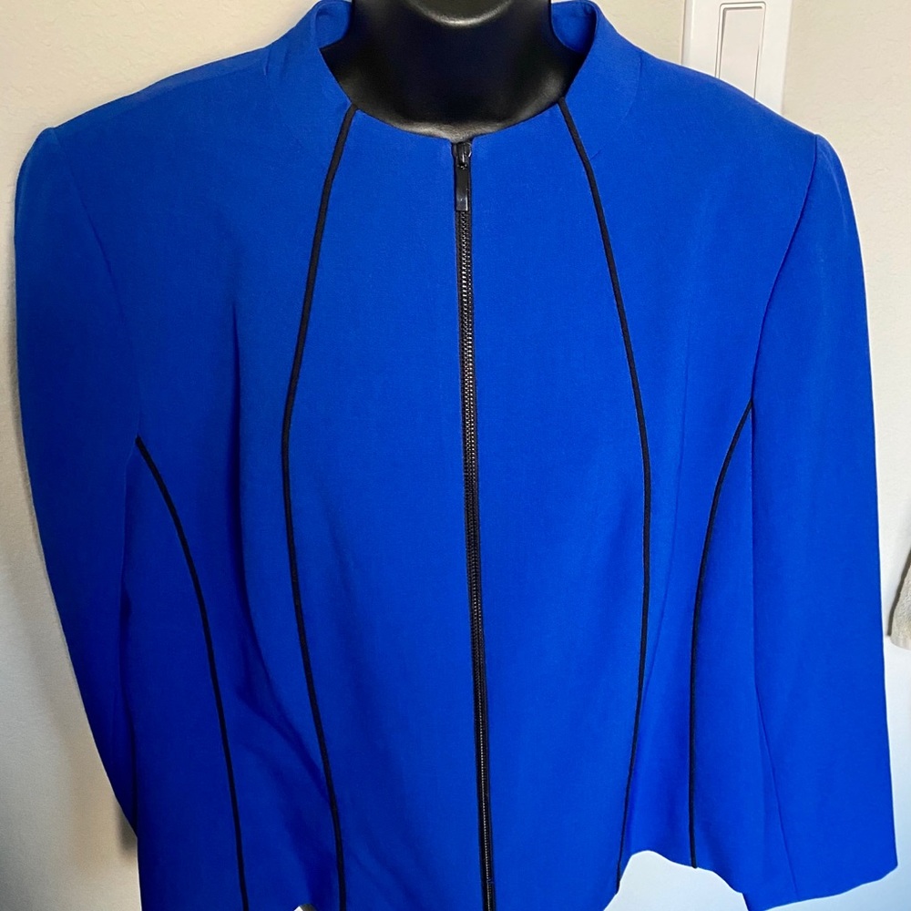 Kasper cobalt blue with black piping.